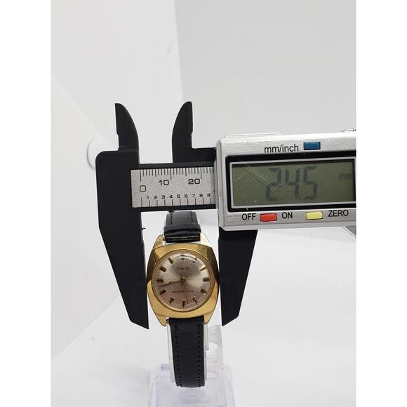 Timex Women\'s watch. Silver face, gold bevel. Dress watch main image 3